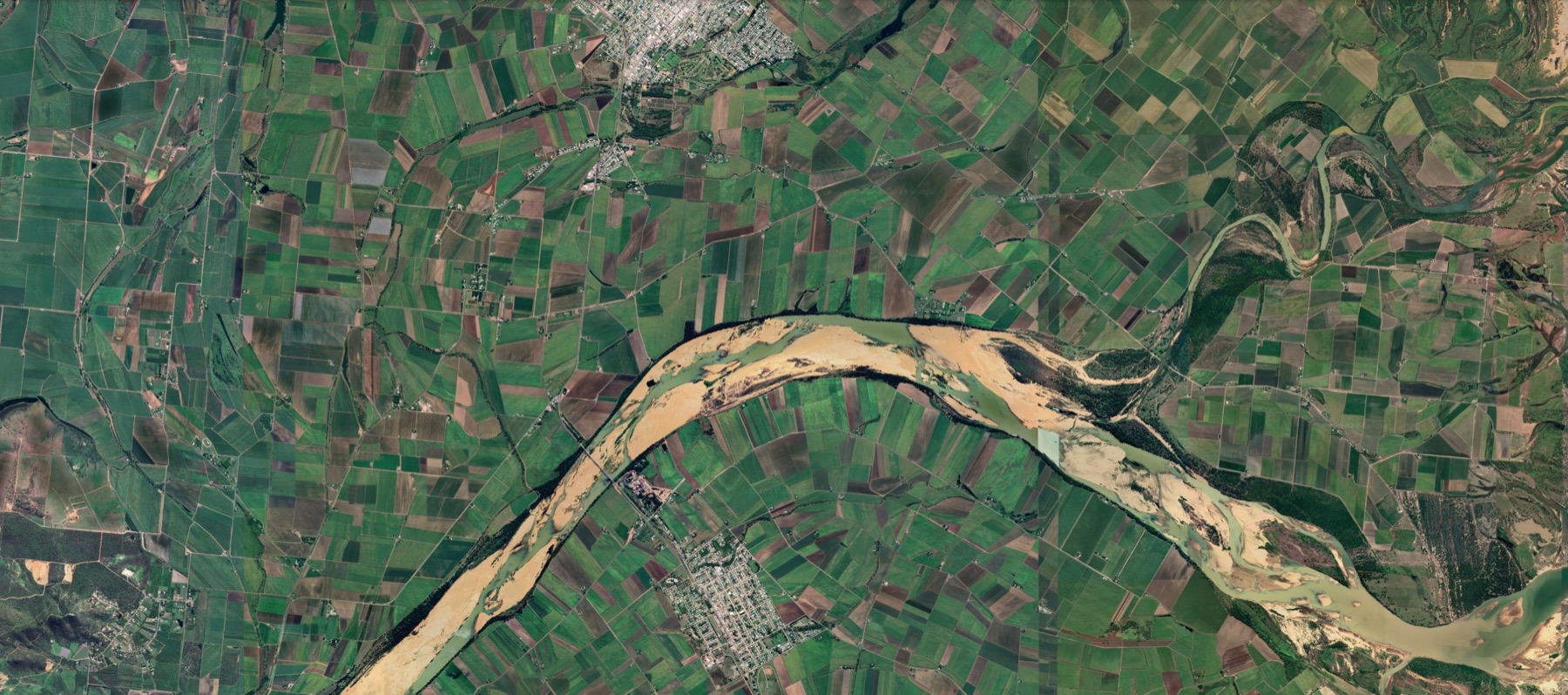 Aerial view of Australian cropping land surrounding a river system